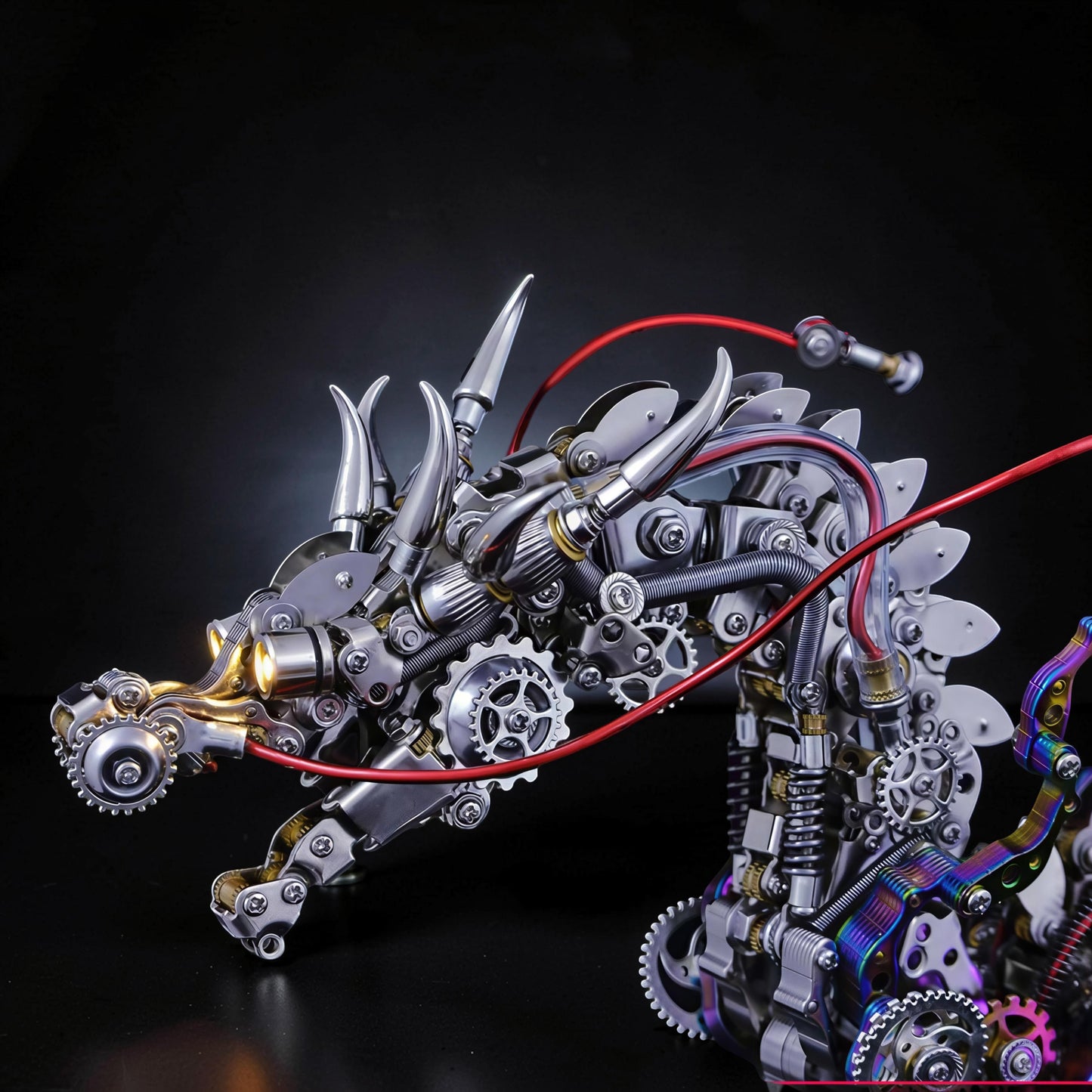 The Curious Mind Chinese Dragon 3D metal model kit with intricate gears, horns, and red tubing. Steampunk-inspired mechanical sculpture.