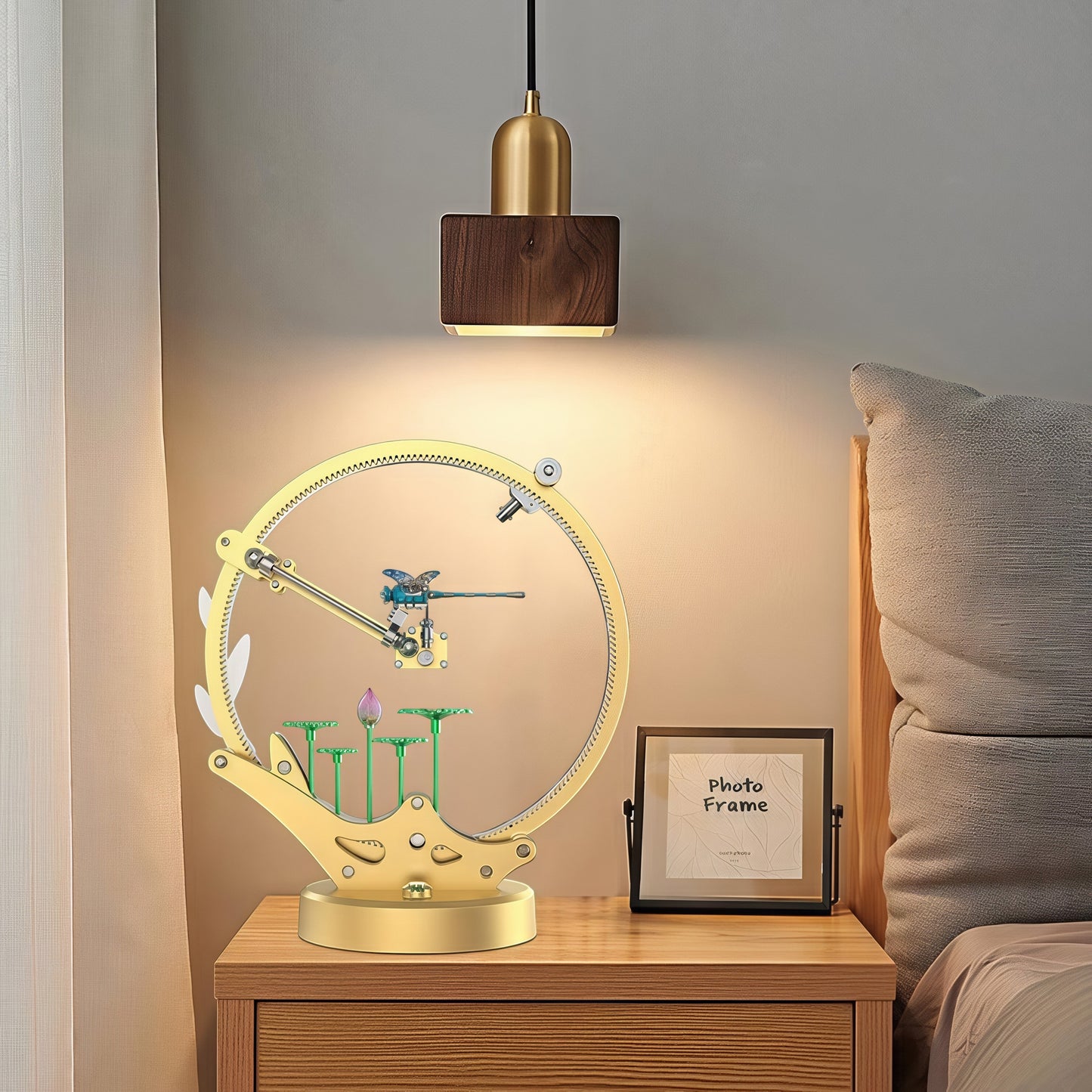 The Curious Mind Flying Dragonfly Kinetic DIY Kit, a mechanical metal model with a golden frame, blue dragonfly, and lotus flowers.