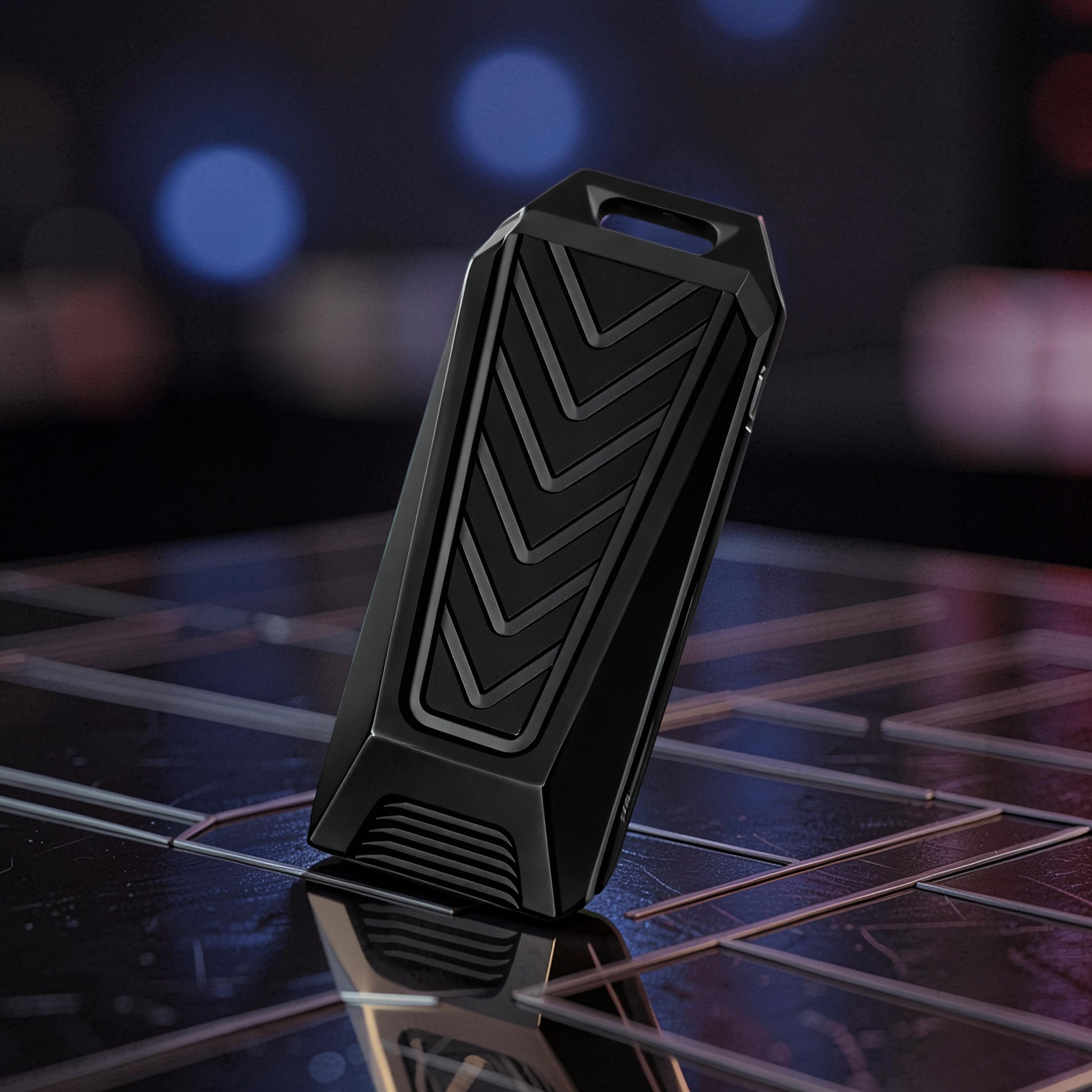 The Curious Mind black stainless steel chevron slider fidget toy with a textured chevron pattern and a loop at the top.