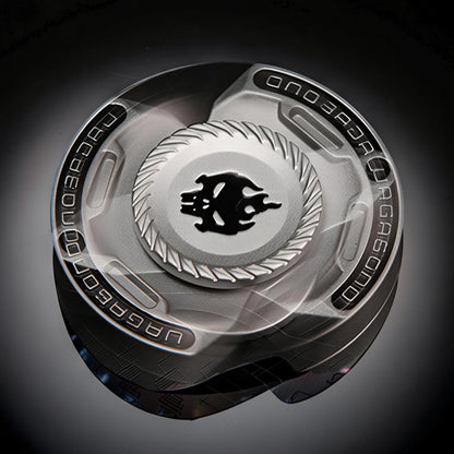 The Curious Mind Butterfly Plus Metal Spinner in black, featuring a dragon emblem and intricate detailing. Smooth, premium EDC fidget toy.