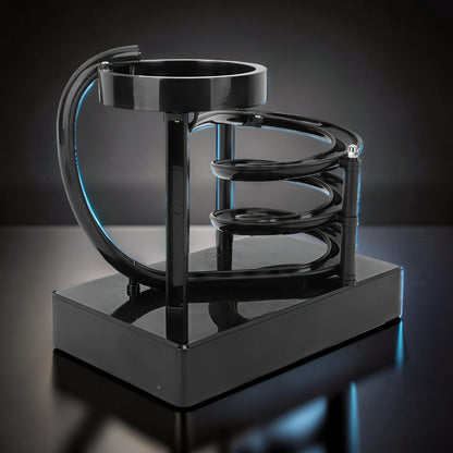 The Curious Mind black electromagnetic perpetual motion machine with a spiral track and a circular loop, made of wood, metal, and magnet.