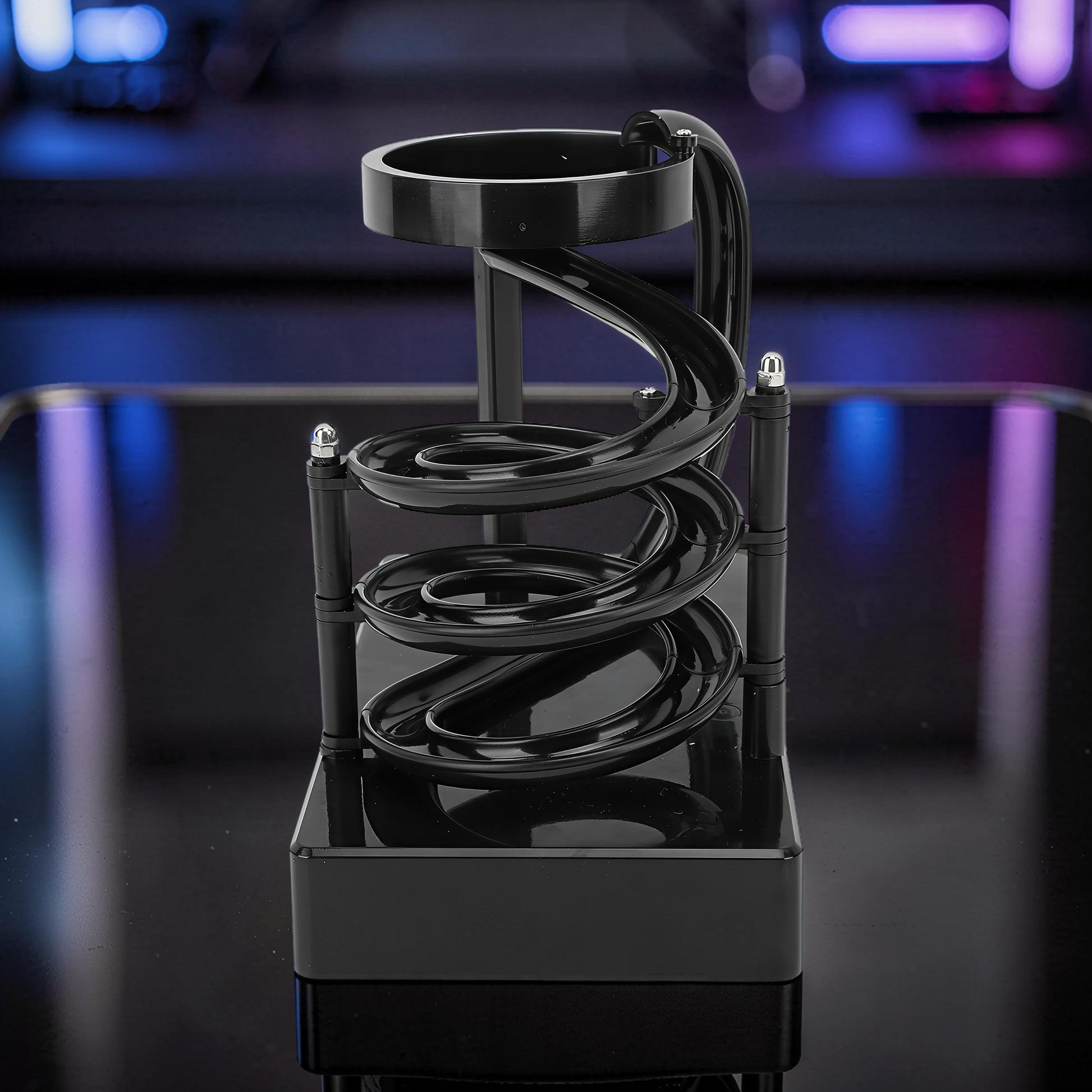 The Curious Mind black electromagnetic perpetual motion machine with a spiral track and metal ball, made of wood, metal, and magnet.