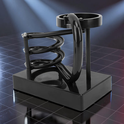 The Curious Mind black electromagnetic perpetual motion machine with a spiral track and magnetic elements, made of wood, metal, and magnet.