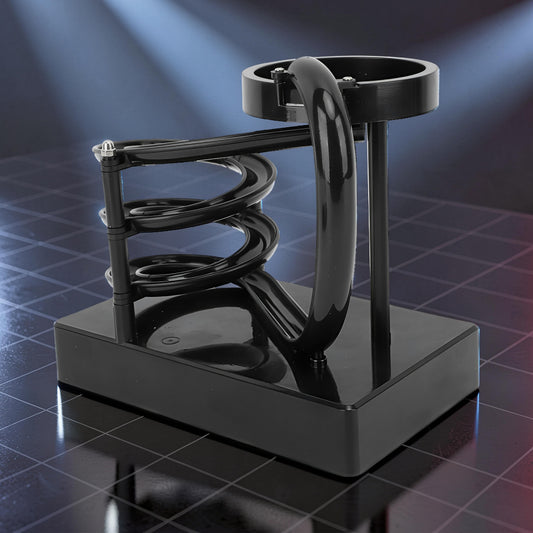 The Curious Mind black electromagnetic perpetual motion machine with a spiral track and magnetic elements, made of wood, metal, and magnet.