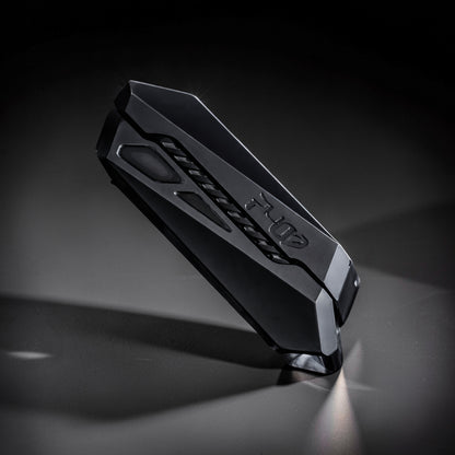 The Curious Mind Stainless Steel Chevron Slider fidget toy with a compact, metallic black design and textured grip.