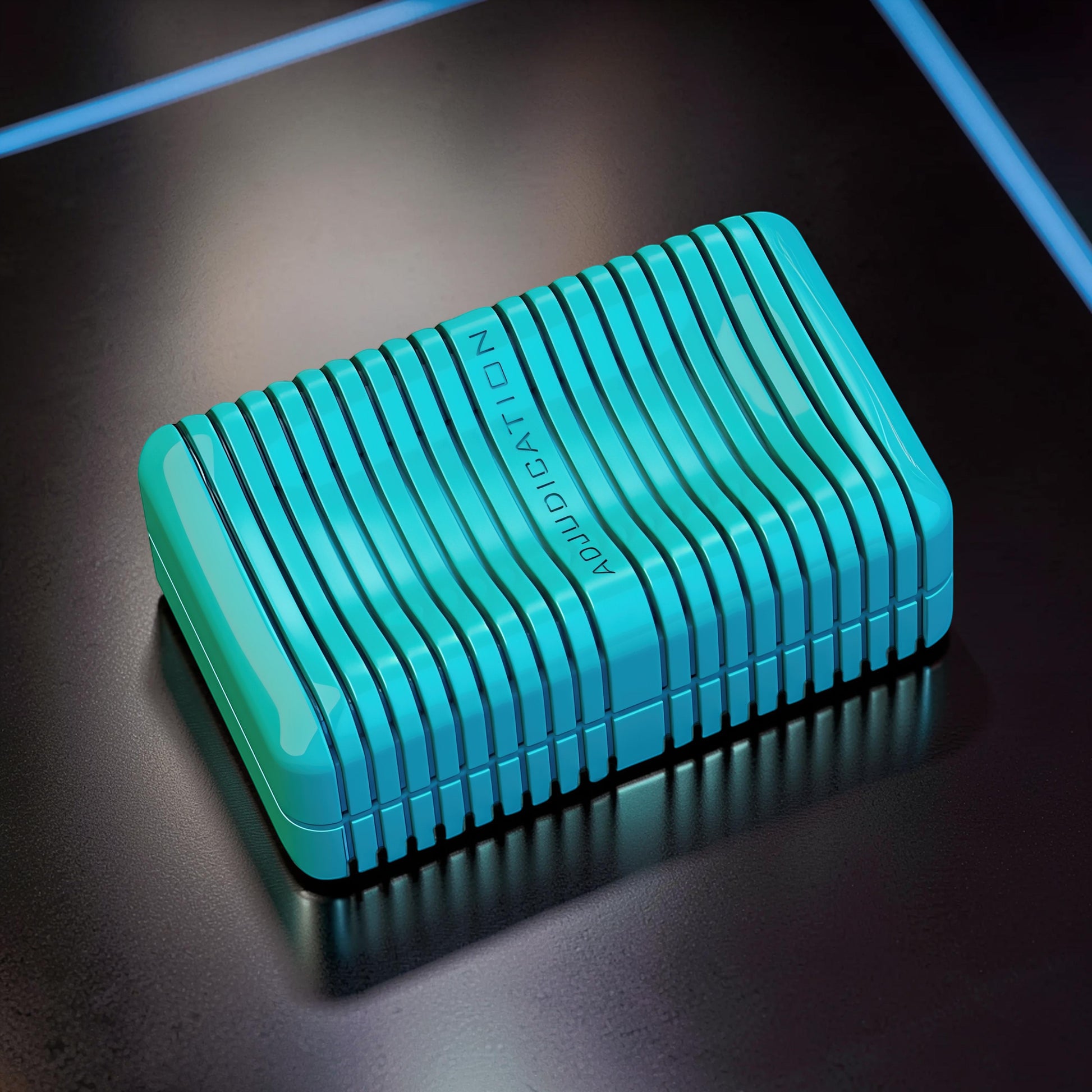 The Curious Mind blue metal magnetic slider fidget toy with wavy ridges and 'ADJUDICATION' text.