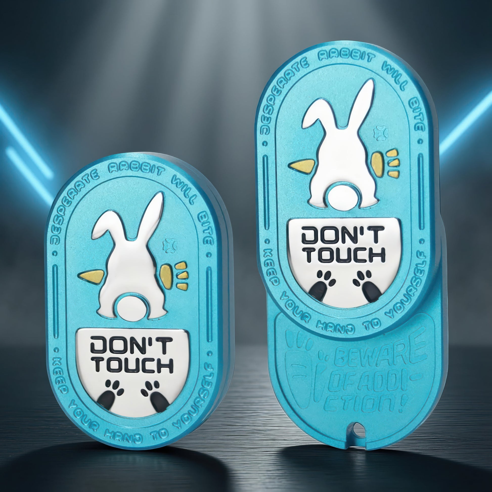 The Curious Mind Don't Touch Rabbit Slider fidget toy in blue metal with a cartoon rabbit and warning text.