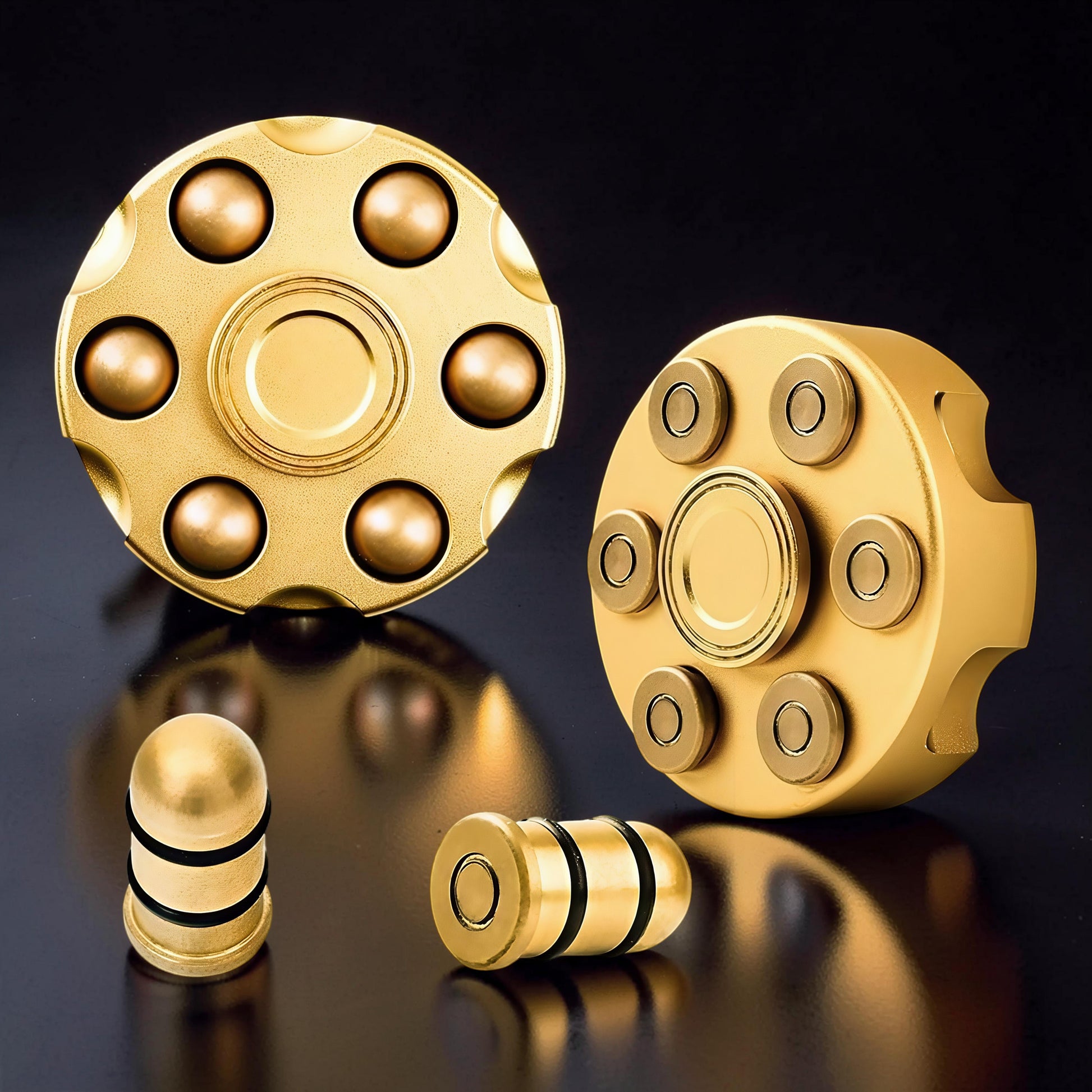 The Curious Mind Brass Finger Gyro Spinner with bullet-shaped weights and smooth rotation. Gold metal fidget toy.