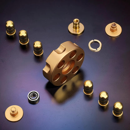 The Curious Mind Brass Finger Gyro Spinner with bearing and components. Gold-tone metal.