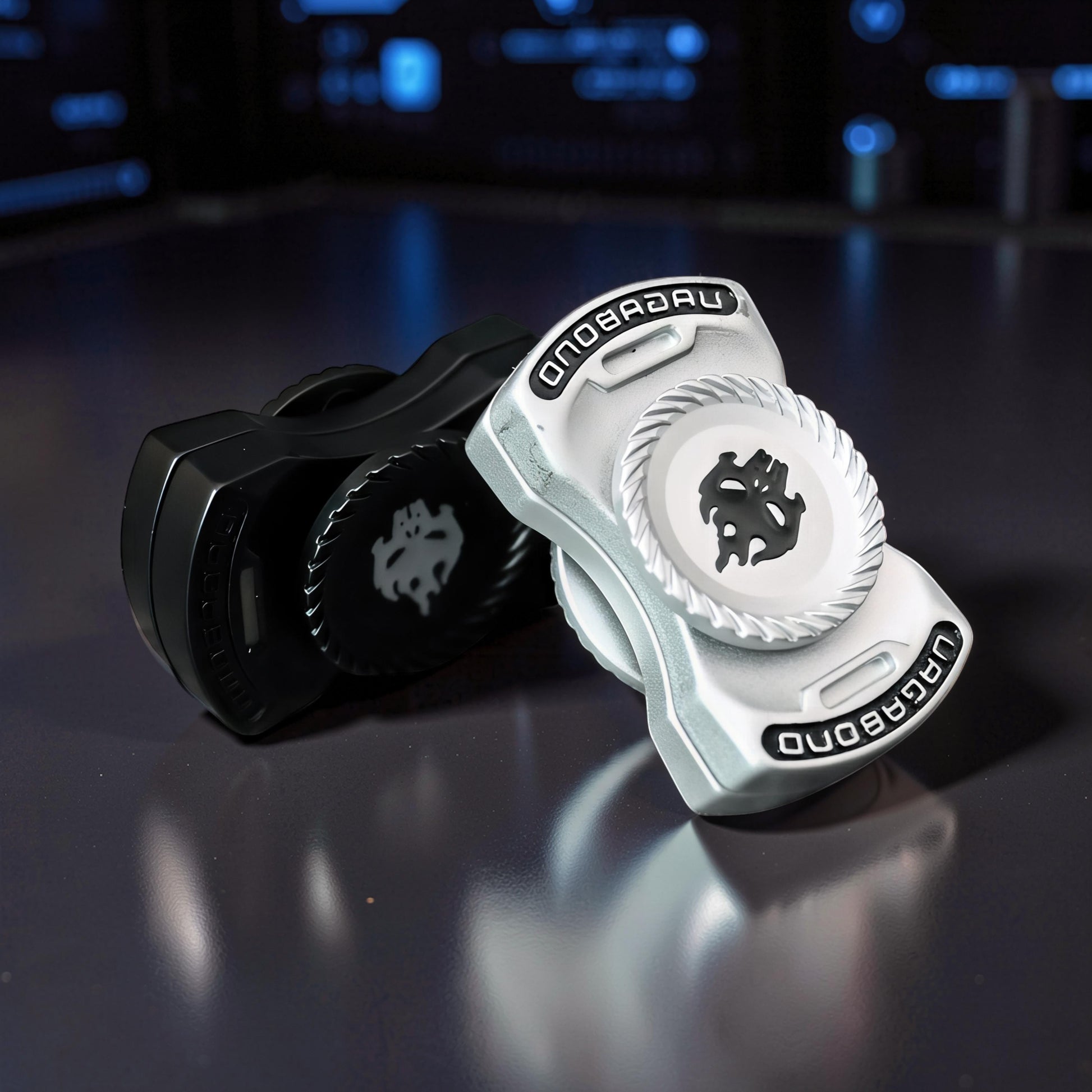 The Curious Mind Butterfly Plus Metal Spinner in black and silver, featuring a unique logo and smooth spinning action for EDC.