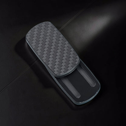 The Curious Mind Carbon Fiber Magnetic Slider fidget toy with a woven carbon fiber texture and sleek grey finish.