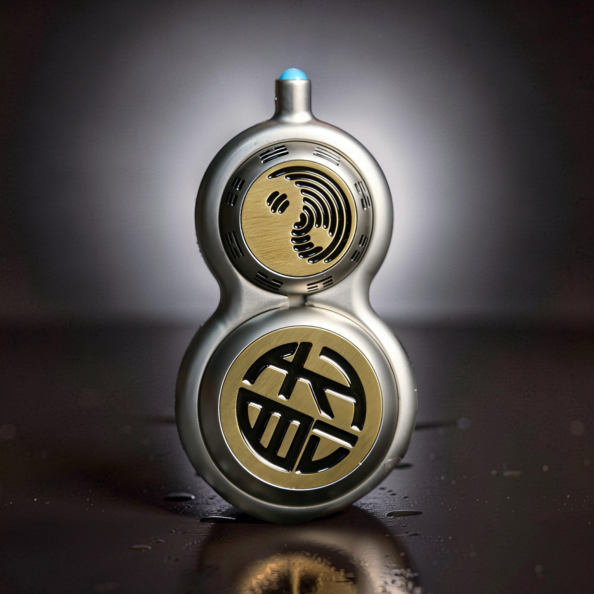 The Curious Mind Cucurbit Gourd Spinner: silver metal fidget toy with gold yin-yang and Chinese character inlays.