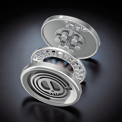 The Curious Mind Demon Coin Push Card Clicker fidget toy, silver metal with skull emblem, compact design for focus and stress relief.