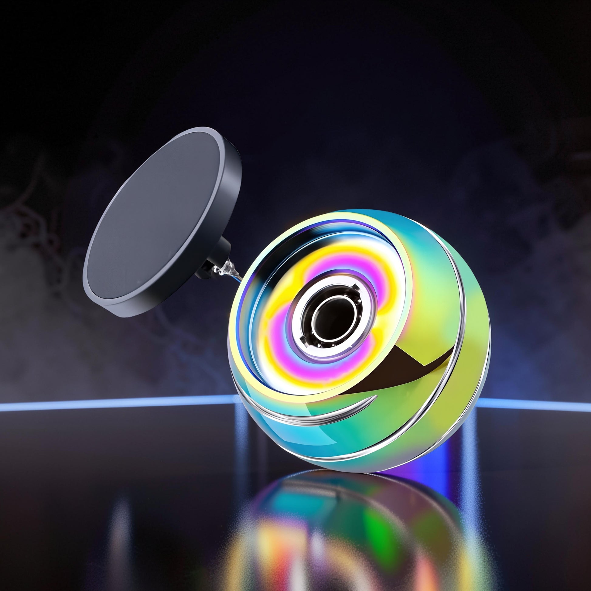 The Curious Mind high-gloss metal desktop fidget spinner with iridescent rainbow finish and magnetic base.