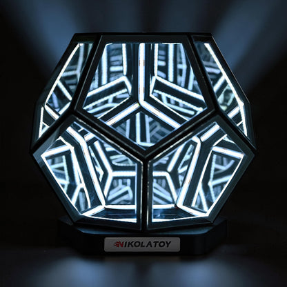 The Curious Mind Infinite Space Abyss Dodecahedron LED Night Light with white LED lights and a black base.