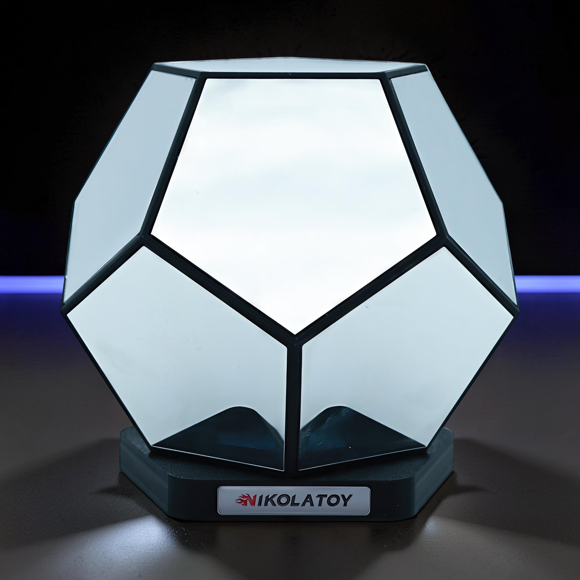 The Curious Mind Infinite Space Abyss Dodecahedron LED Night Light, a geometric desk accent made of white PLA with black trim.