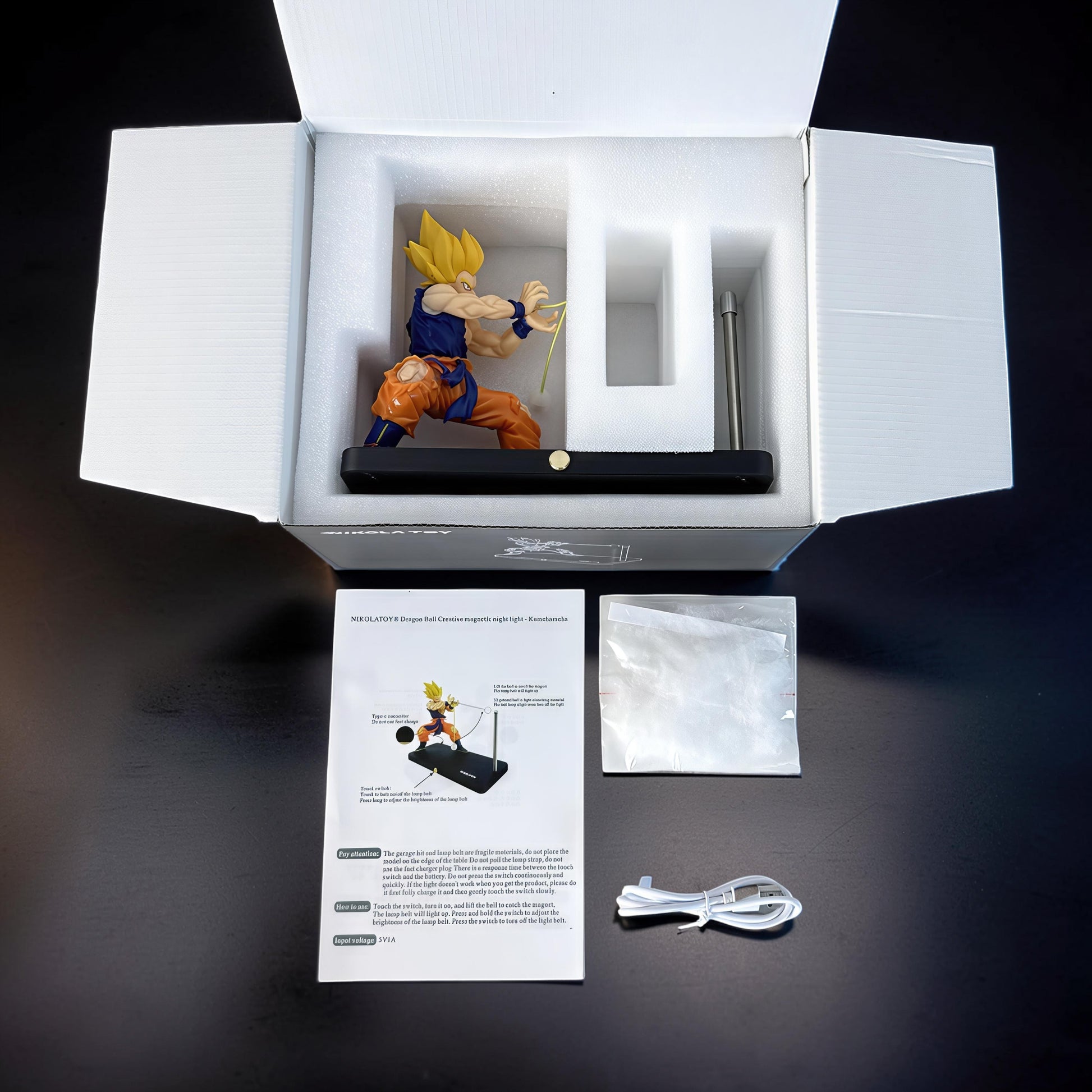 The Curious Mind Dragon Ball Kamehameha night light featuring Goku in an action pose, with magnetic LED display and PLA material.