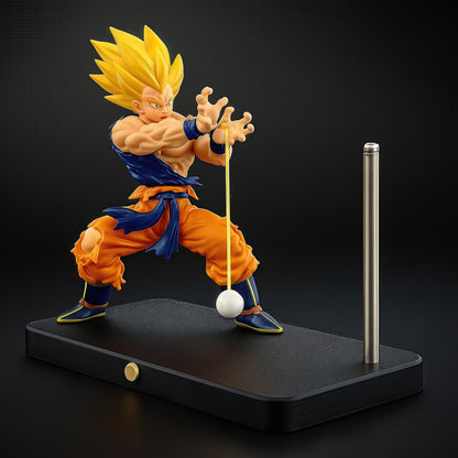 The Curious Mind Dragon Ball Kamehameha Night Light featuring Goku in an orange and blue gi, charging energy with a magnetic LED display.