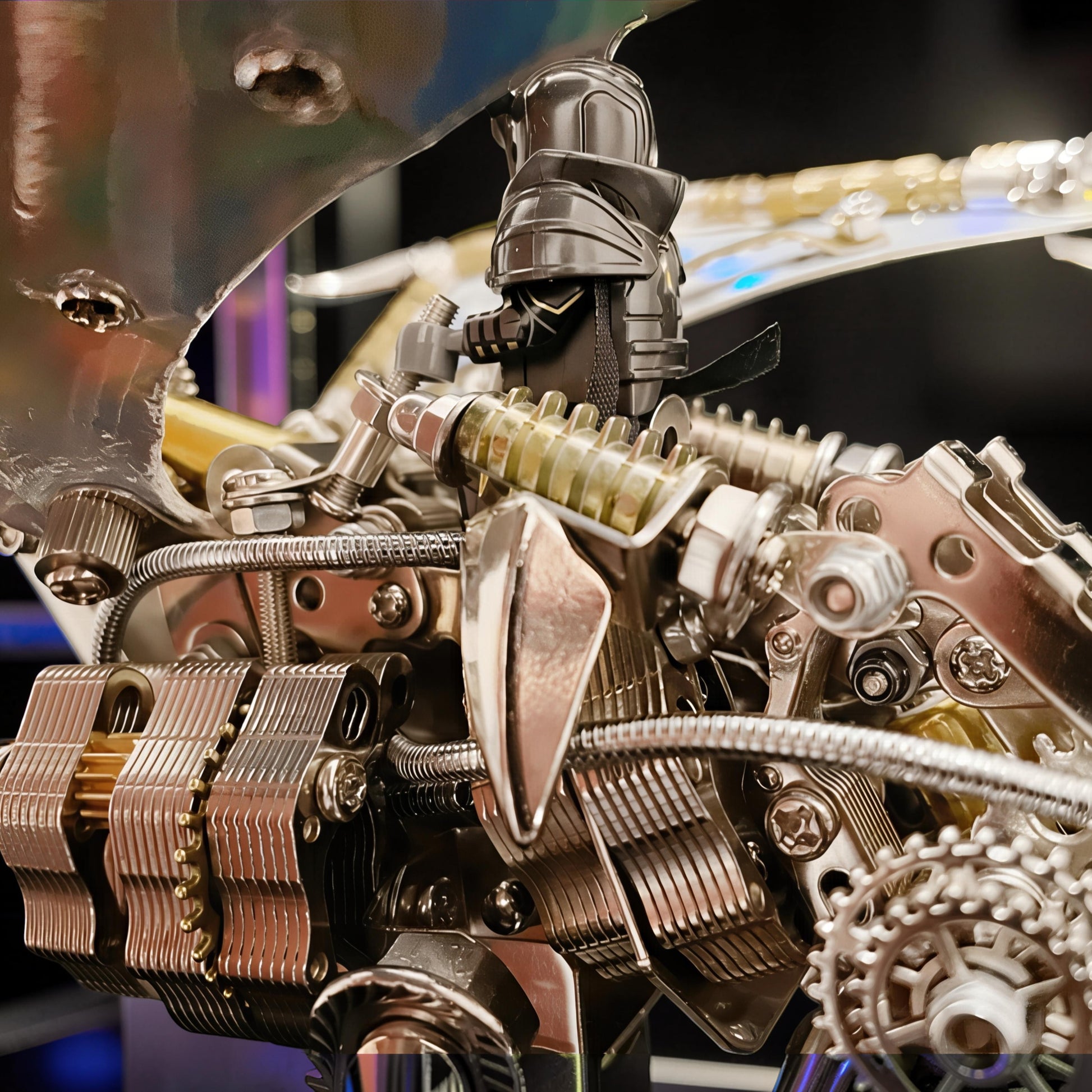 The Curious Mind Dragon 3D metal model kit with intricate mechanical details and iridescent wings, featuring a knight figure.