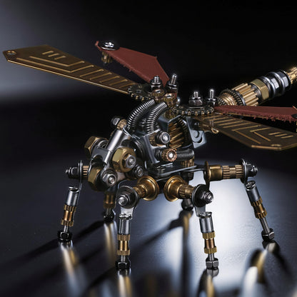 The Curious Mind Dragonfly 3D metal model kit with intricate gears, brass and silver metallic finish, and brown leather accents on wings.
