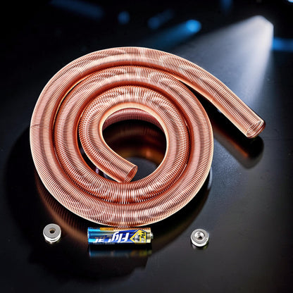 The Curious Mind Electromagnetic Train Puzzle Toy copper coil with battery and magnets on black surface.