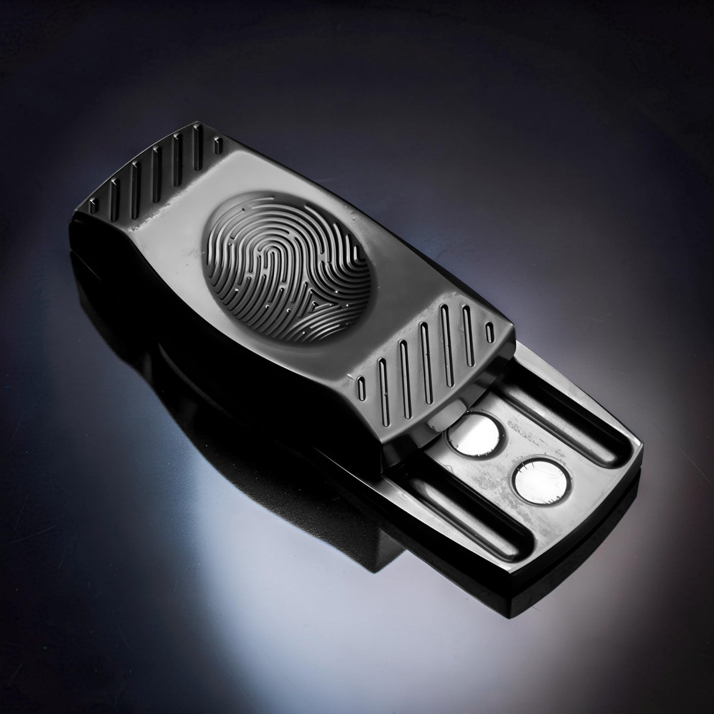 The Curious Mind Fingerprint Pattern Push Slider, a compact black metal fidget toy with a tactile fingerprint design and satisfying slide action.