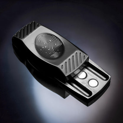 The Curious Mind Fingerprint Pattern Push Slider, a compact black metal fidget toy with a tactile fingerprint design and satisfying slide action.