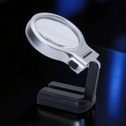 The Curious Mind foldable LED magnifier with silver handle and black base, ideal for hobbyists and detail work.