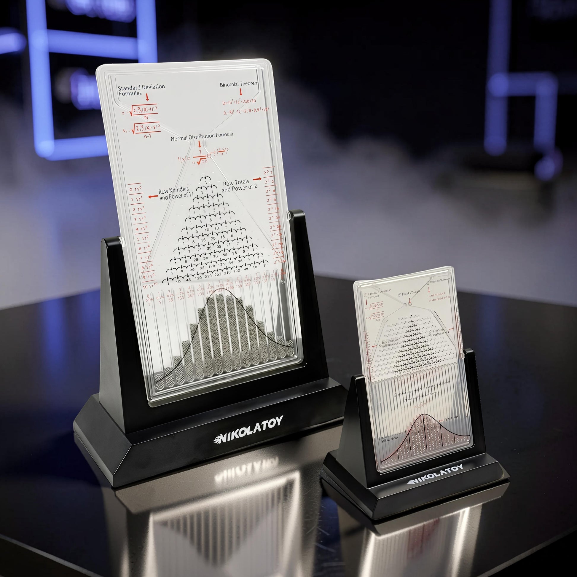 The Curious Mind Large Galton Board Distribution Model, acrylic and metal, displays probability and physics formulas with a visual representation of the normal distribution.