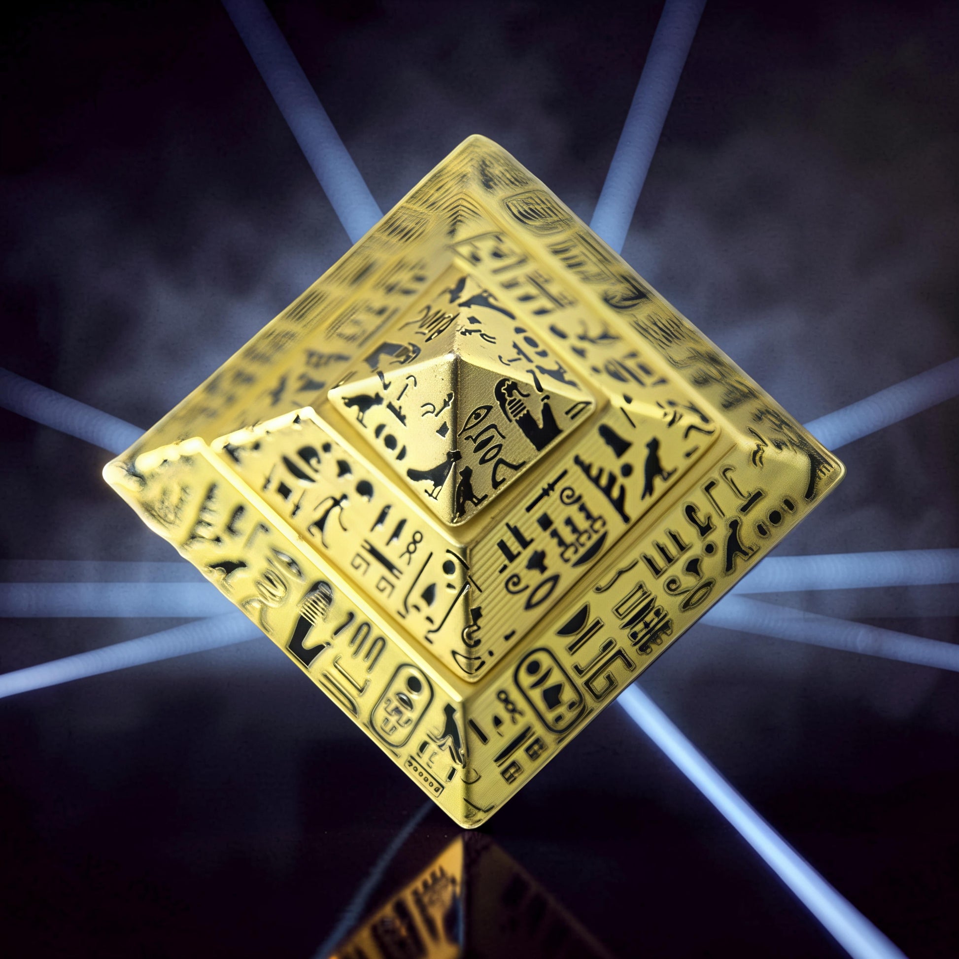 The Curious Mind gold pyramid desk spinner with Egyptian hieroglyphs, metal construction, and balanced profile for satisfying rotation.