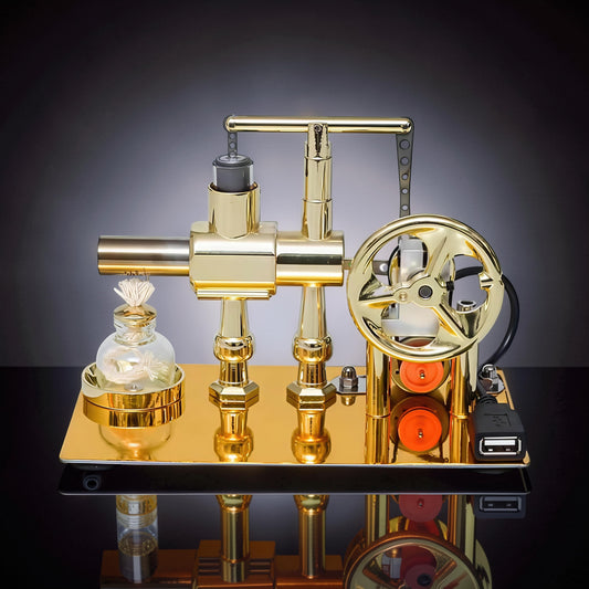 The Curious Mind Stirling Engine Model, a polished gold metal mechanical device with a flywheel, USB port, and LED light, ideal for desktop display and engineering enthusiasts.