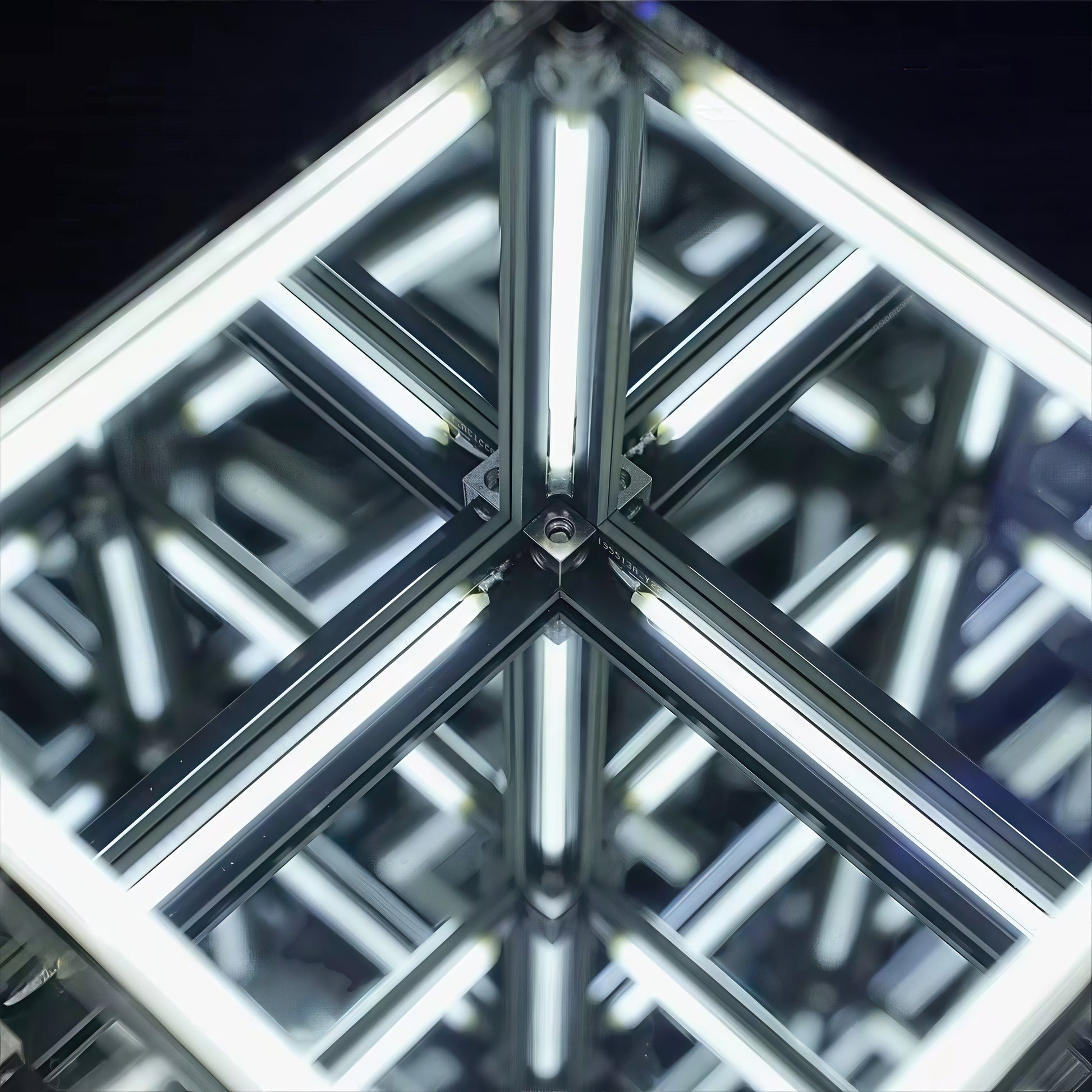 The Curious Mind 4D Infinite Space Abyss Night Light features a cube-like structure with white LED lights creating an infinite reflection effect. Made of acrylic and ABS.