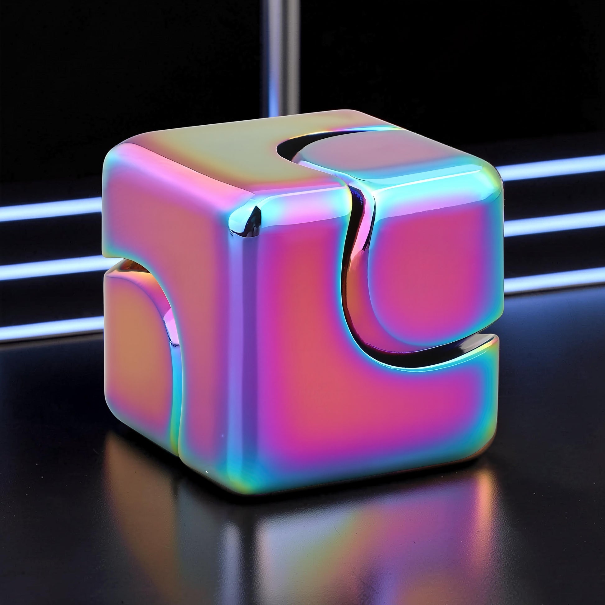 The Curious Mind Iridescent Spinner Cube, a compact metal fidget toy with a rainbow metallic finish and geometric design.