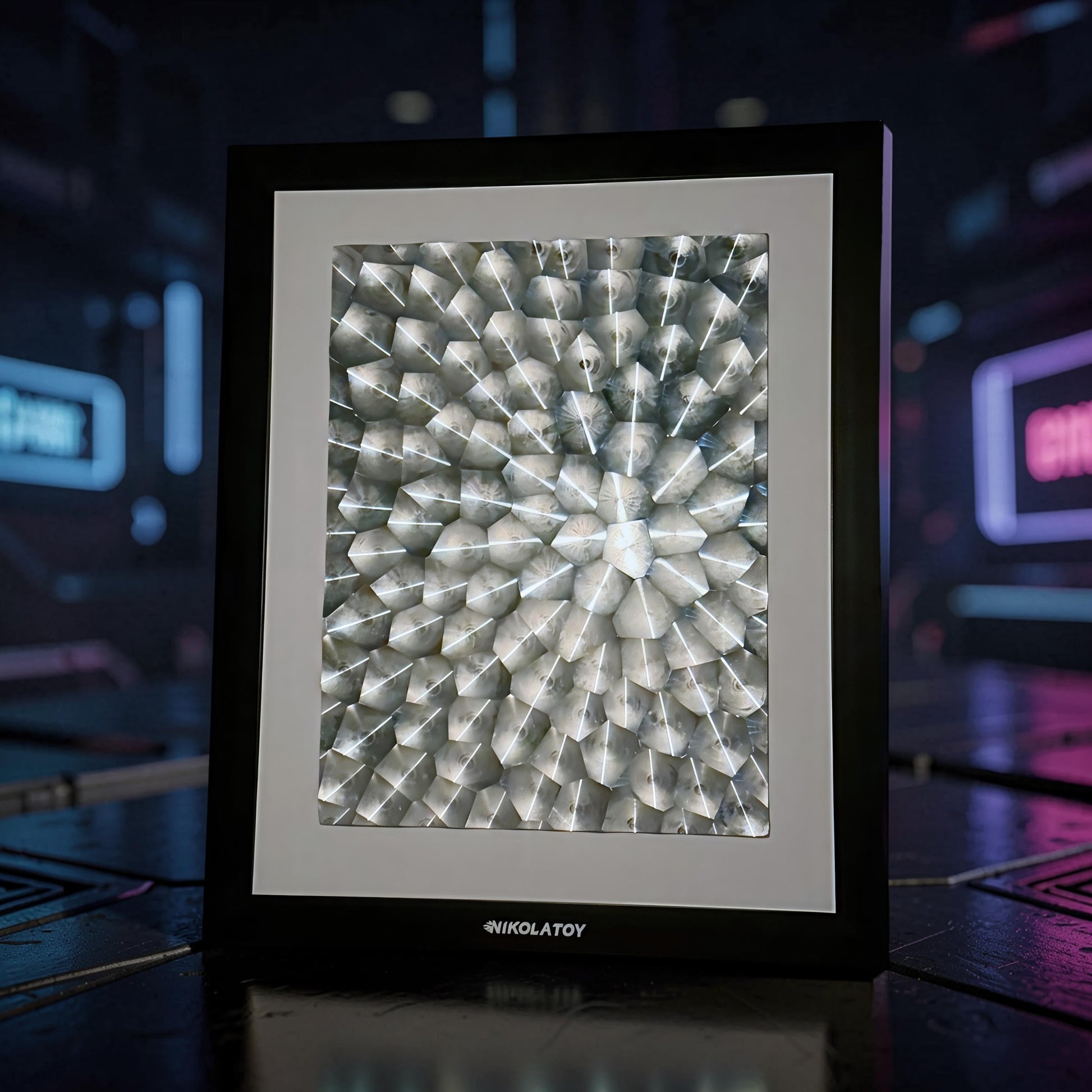 The Curious Mind Laser Light Effect Art Frame features a geometric, illuminated display with a wood and metal construction. The abstract pattern creates a dynamic visual effect.