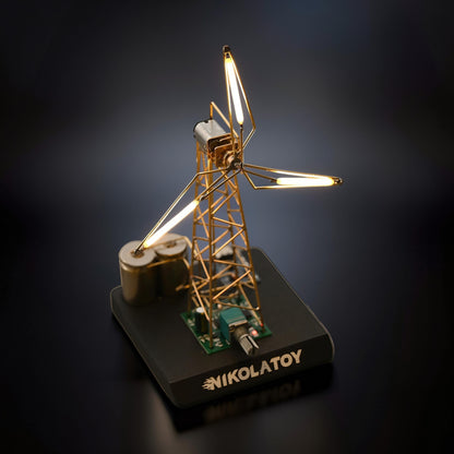 The Curious Mind LED Windmill Night Light, a DIY metal desk lamp with illuminated blades and visible circuitry.