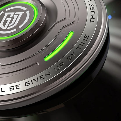 The Curious Mind Long Glow Bar Spinner EDC metal fidget toy with green glowing accents and engraved text.