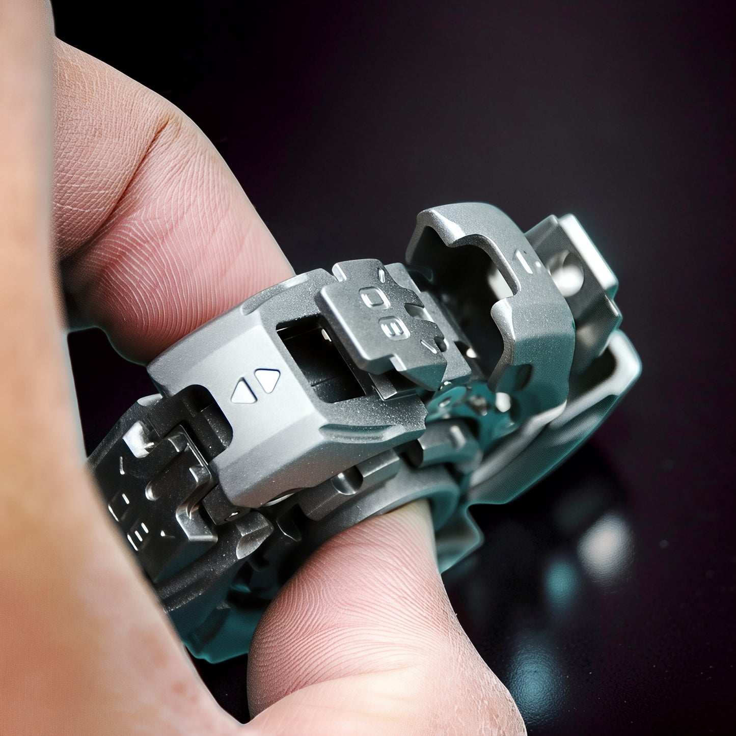The Curious Mind Open Armour magnetic metal spinner with intricate mechanical details and satisfying rotation.
