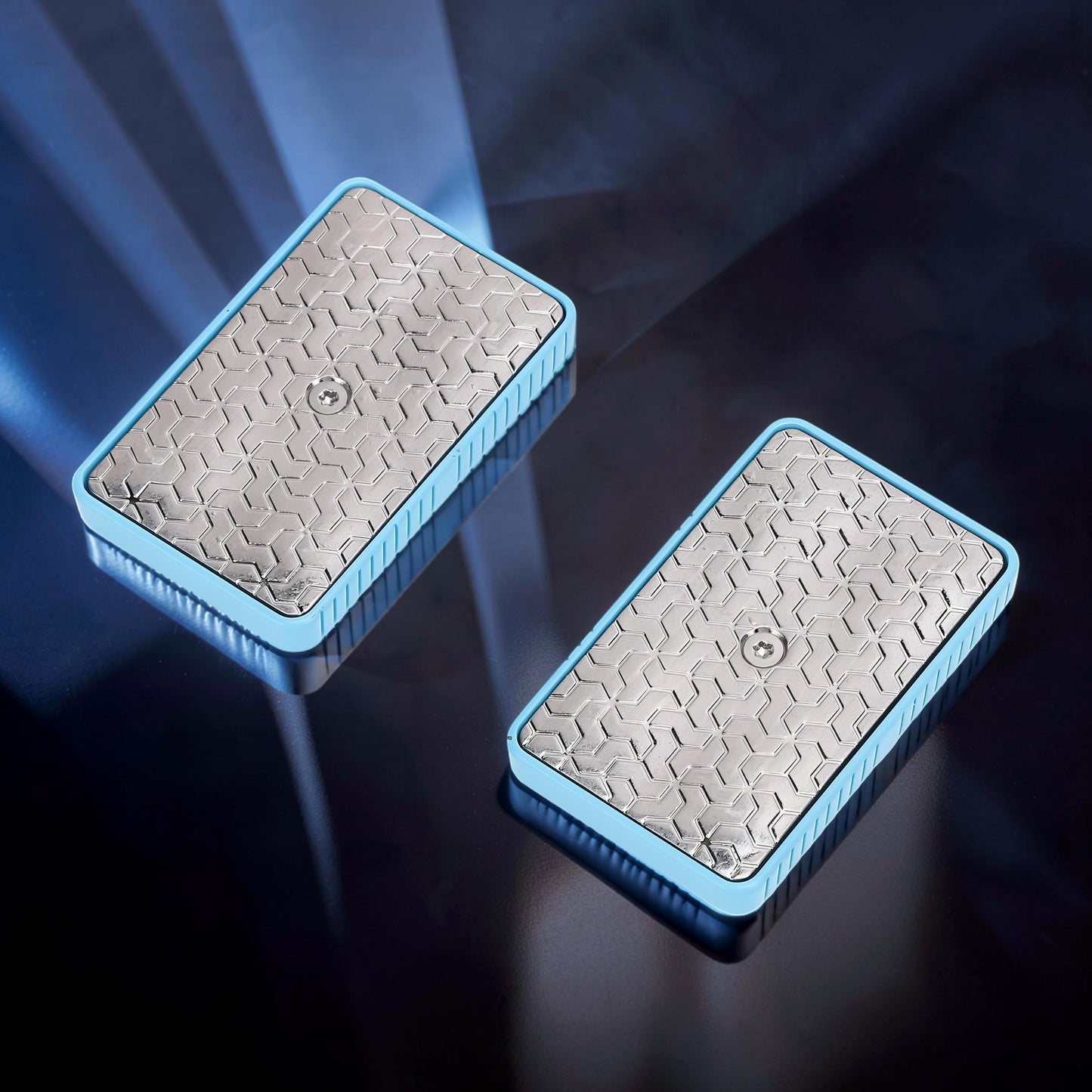 The Curious Mind Soap Box Magnetic Slider fidget toy with silver textured top and light blue frame.