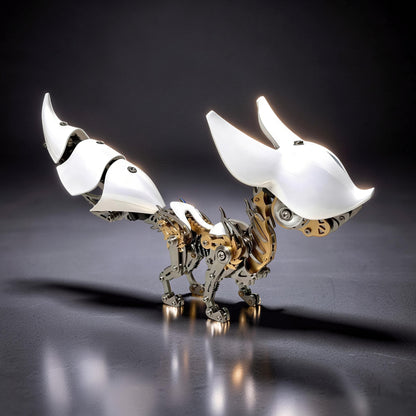 The Curious Mind Mechanical Fox 3D metal model kit with white and metallic gold accents. Intricate gears and joints visible.