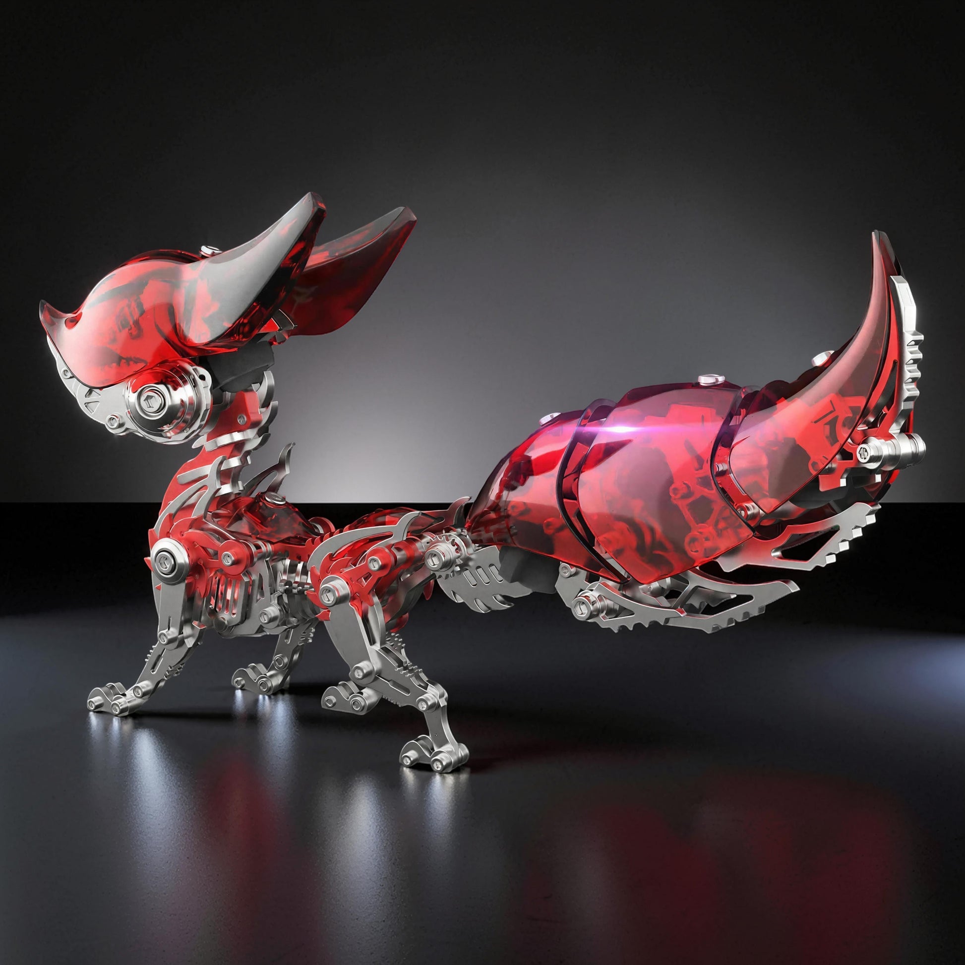 The Curious Mind Mechanical Fox 3D metal model kit with metallic silver frame and translucent red accents.