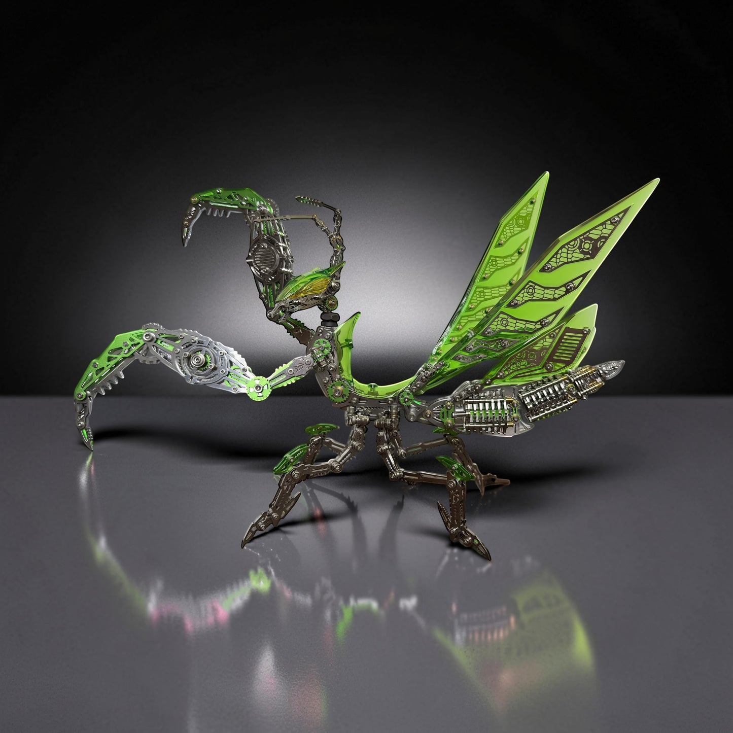 The Curious Mind Mechanical Mantis 3D metal model kit with green wings and metallic body. Intricate steampunk insect design.