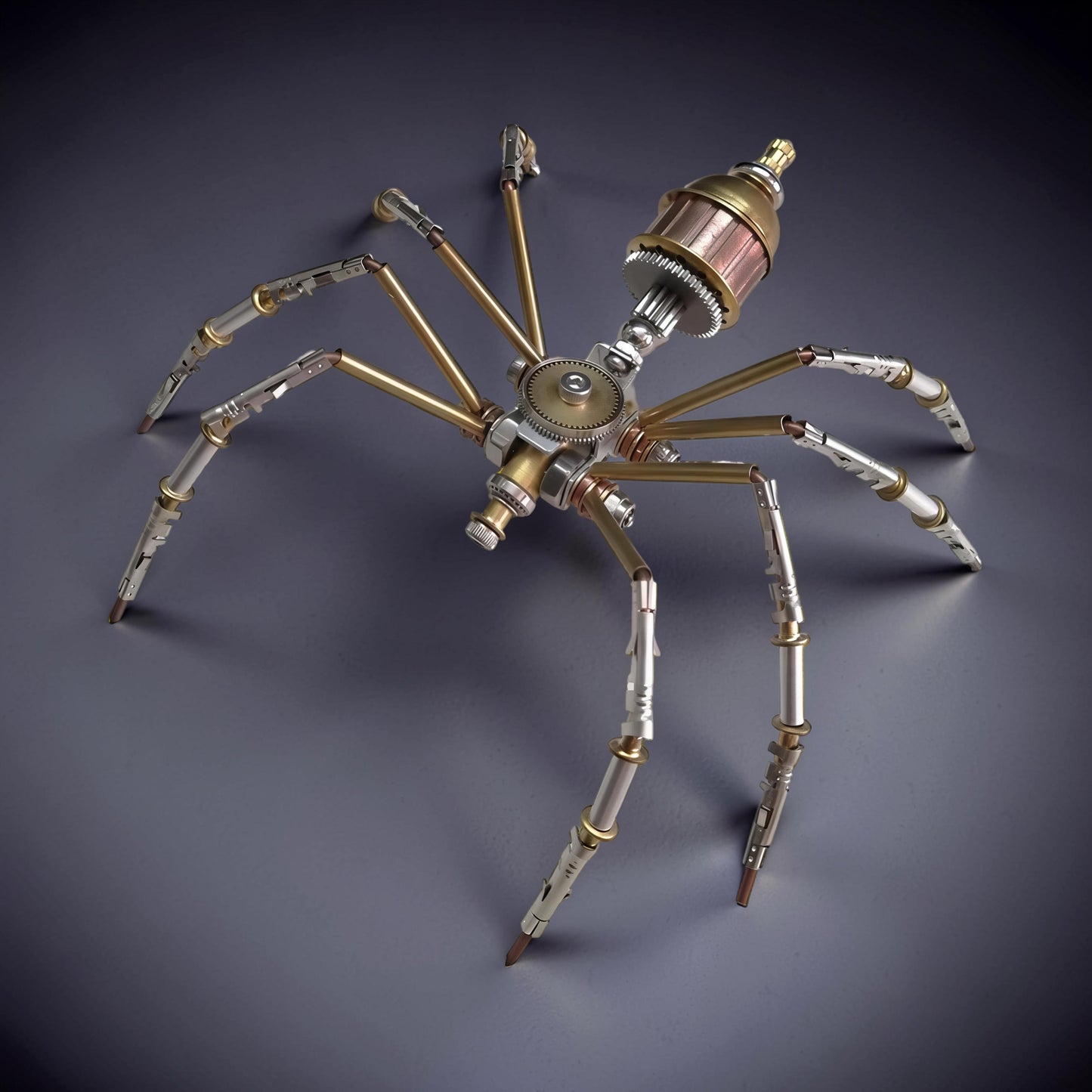 The Curious Mind Style C mechanical spider model kit, made of metal with brass and silver accents, featuring intricate gears and articulated legs.
