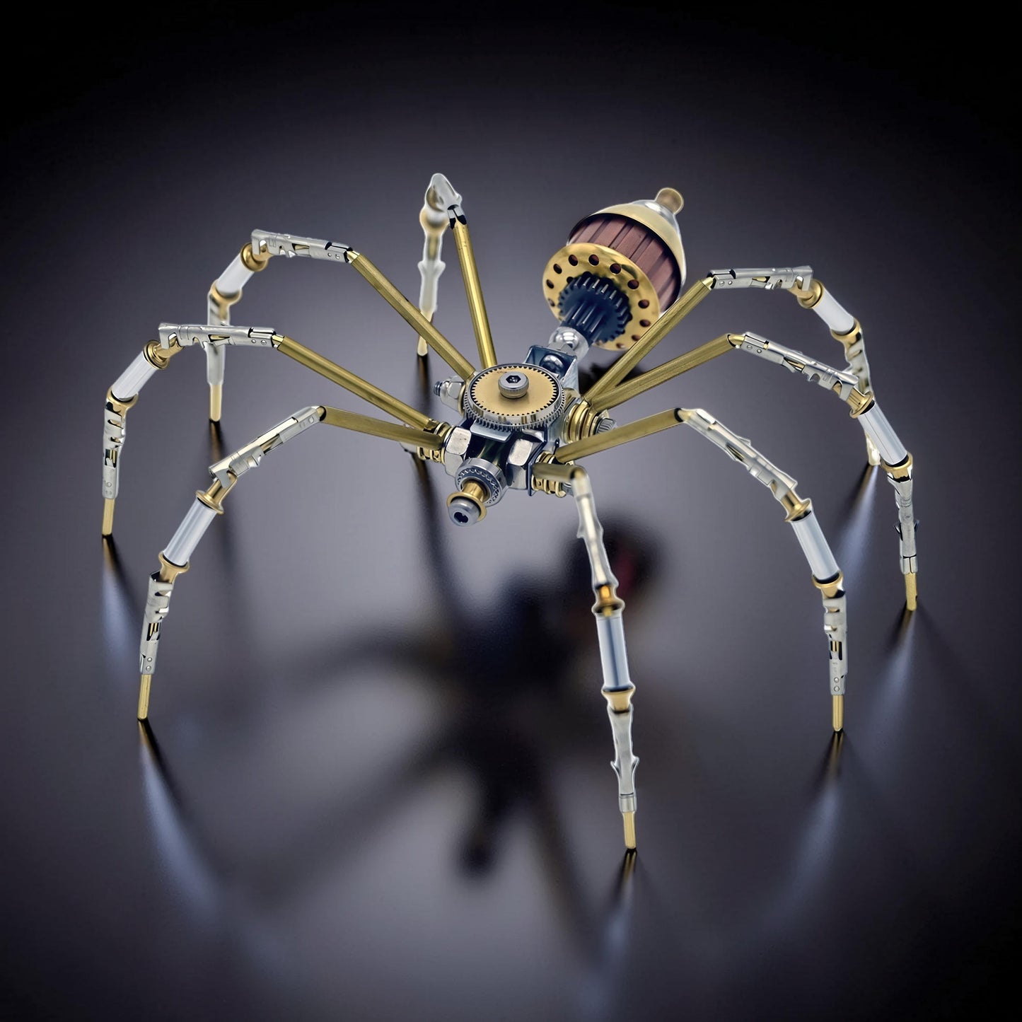 The Curious Mind Style C mechanical spider DIY kit, made of metal, with intricate gears and brass accents.