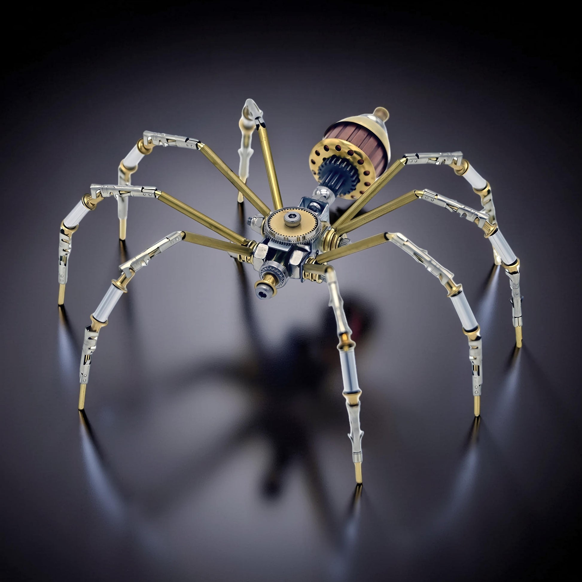 The Curious Mind Style C mechanical spider DIY kit, made of metal, with intricate gears and brass accents.