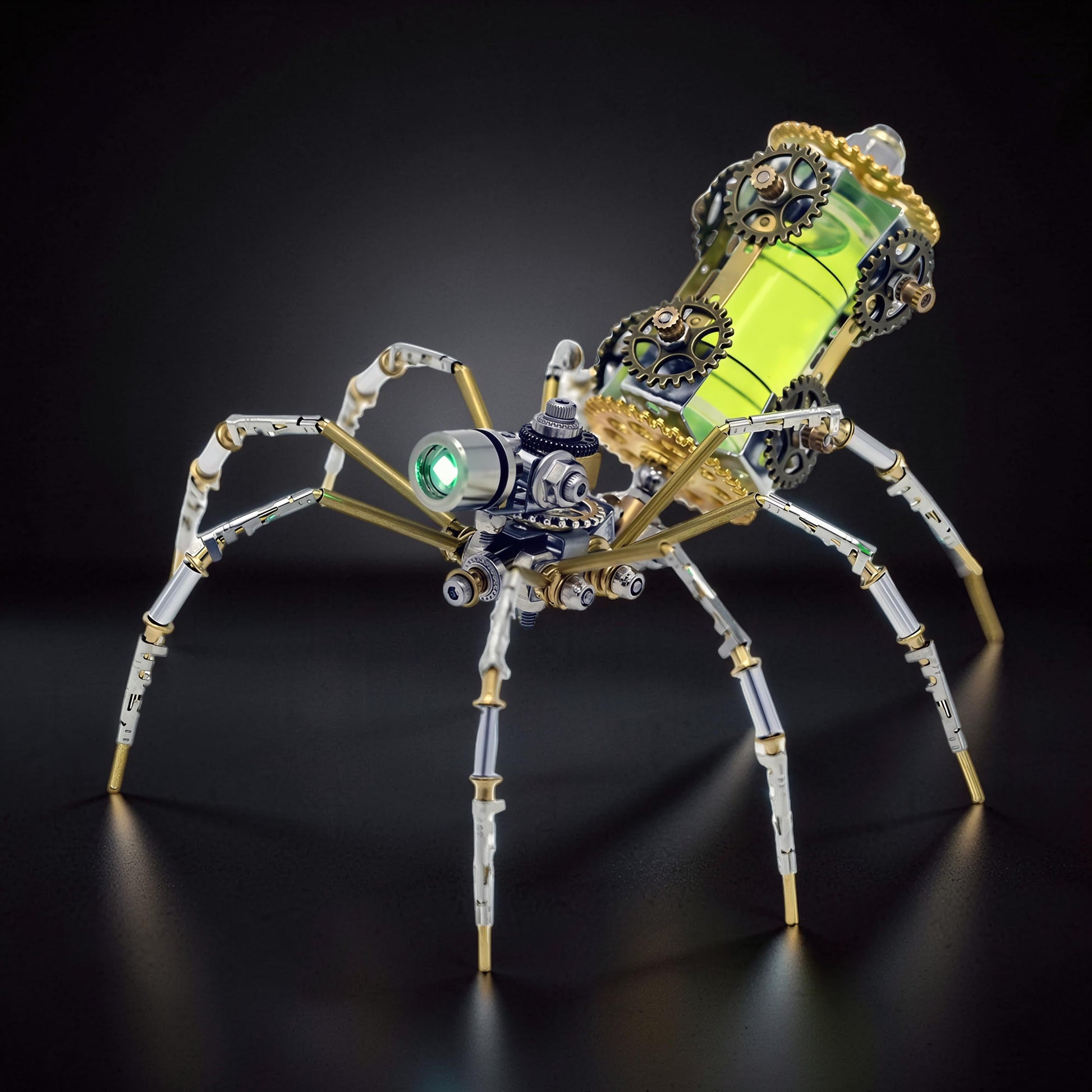 The Curious Mind mechanical spider DIY kit, Style E, with metal gears and a green liquid-filled body.