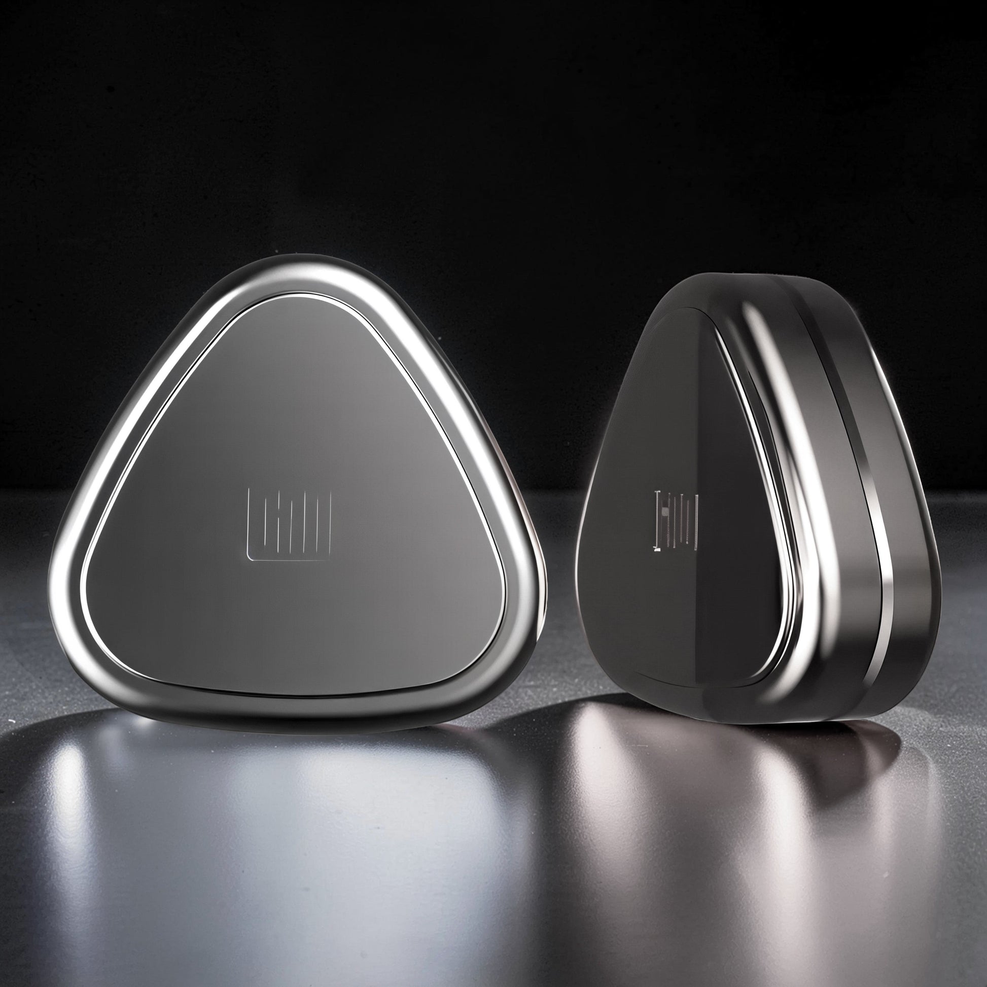 The Curious Mind Rice Ball Push Card Fidget, a compact, metallic, triangular slider with a tactile click mechanism.