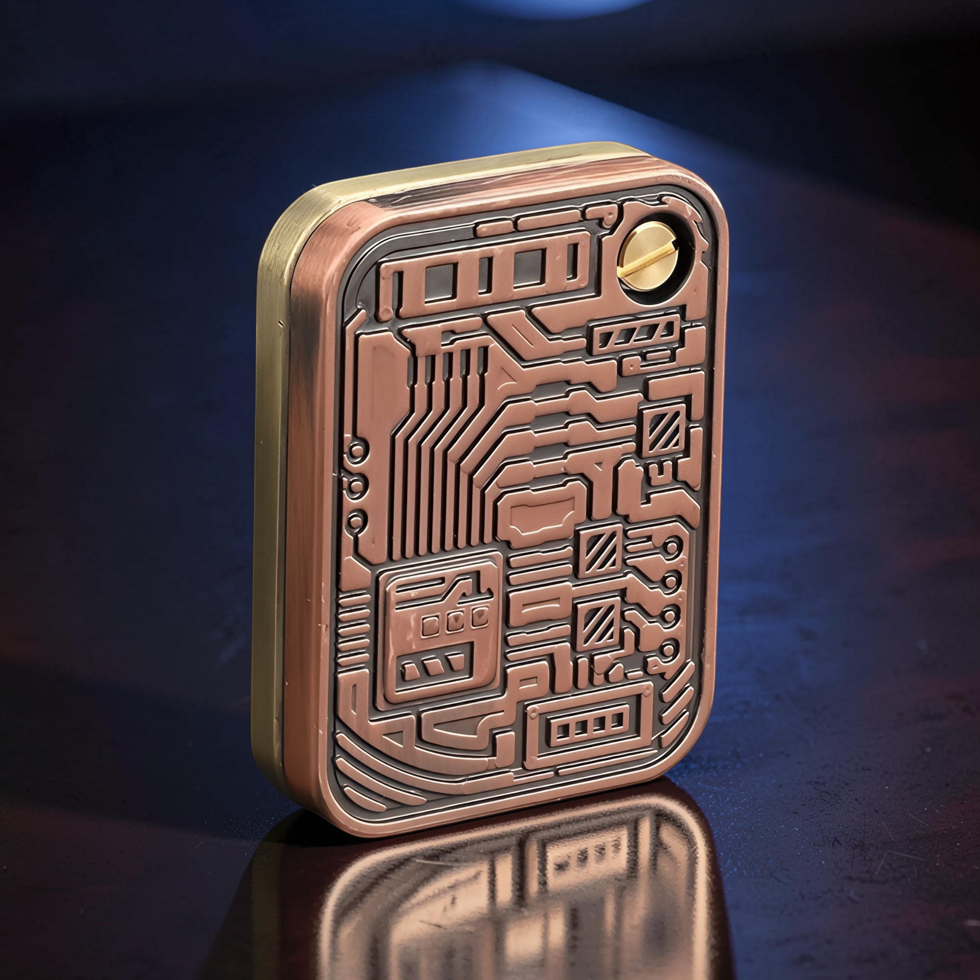 The Curious Mind Three-Body Push Card Fidget, a compact metal fidget toy with a copper and brass finish, featuring a detailed circuit board design for tactile stress relief.