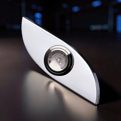 The Curious Mind Power Eye Sensory Spinner, a premium EDC metal fidget spinner with an all-seeing eye design.