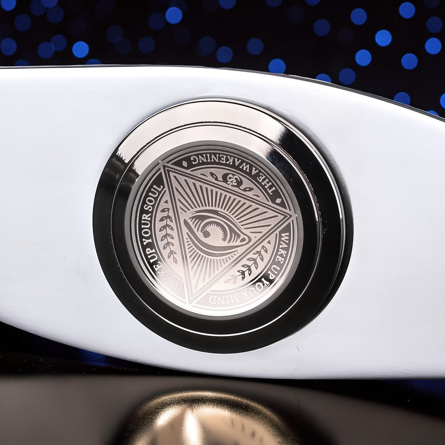 The Curious Mind Power Eye Sensory Spinner, a premium metal fidget toy with an all-seeing eye design and inspirational text.