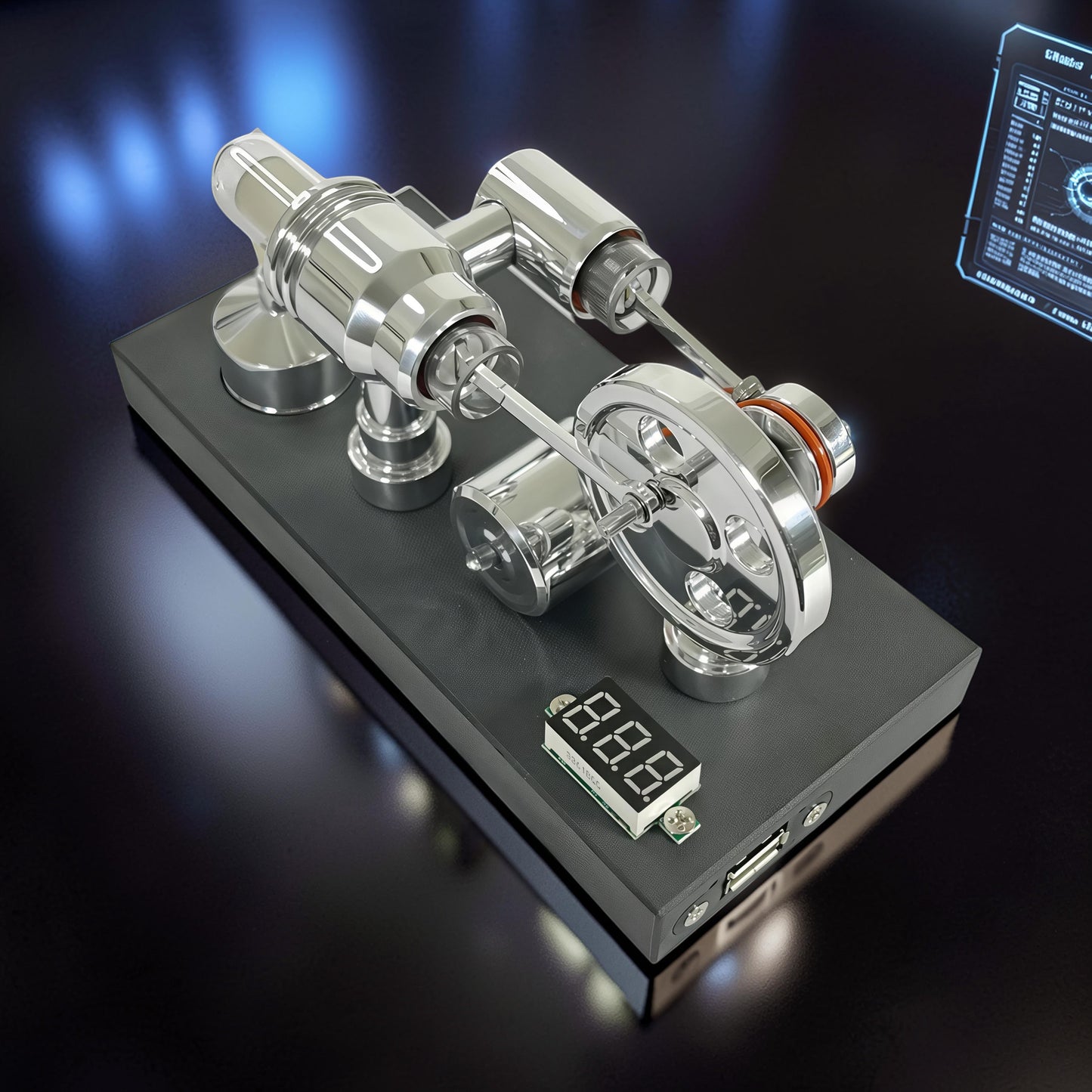 The Curious Mind mirror-polished metal Stirling engine model with voltmeter and USB port, featuring intricate mechanical parts and a digital display.